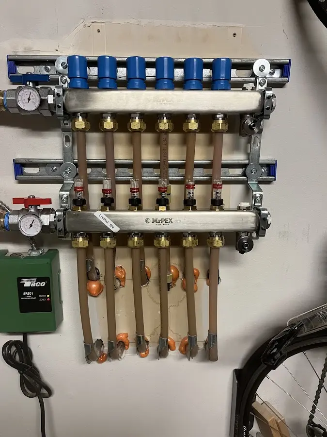 Plumber performing Water Heater Repair at a residential property in Tara Hills